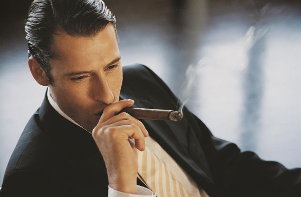 Rich-Man-Smoking-Cigar